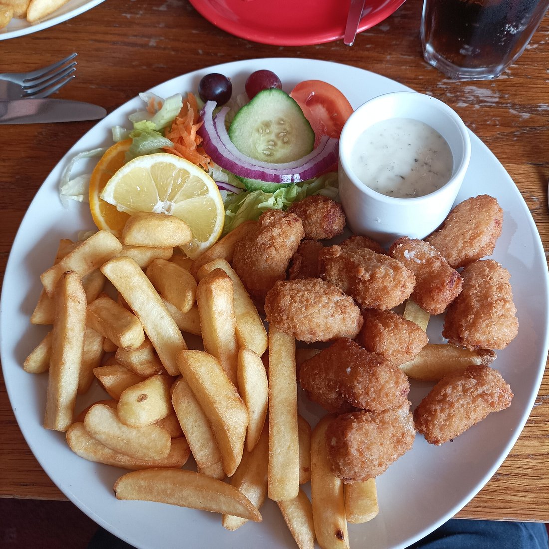 Scampi, chips and salad served at The Alpine
